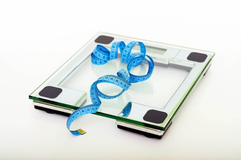 gain muscle mass track weight scale
